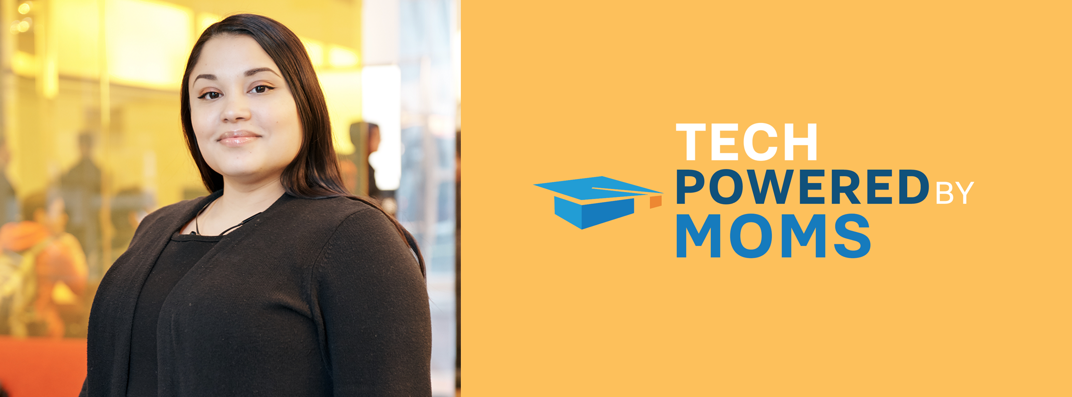 Woman standing in a workspace, next to the "Tech Powered By Moms" logo on a yellow banner.