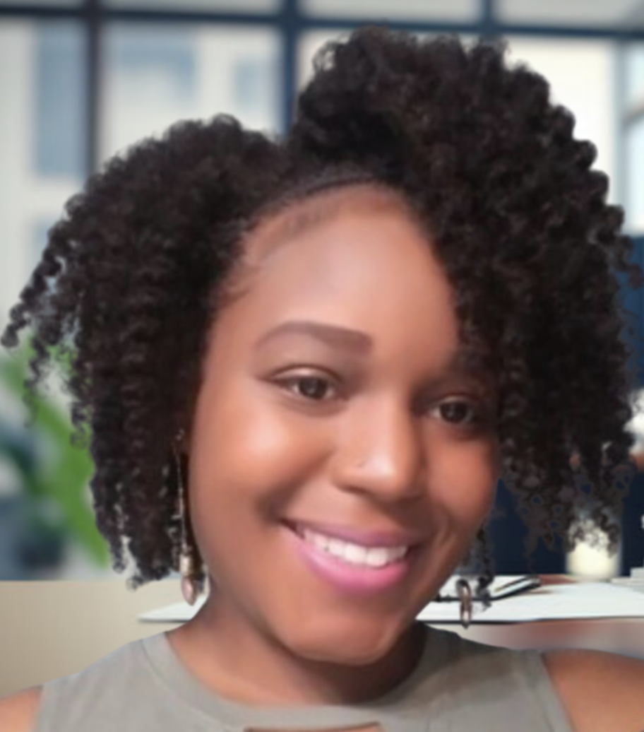 Headshot of Kristina Boateng with curly hair in a professional setting.