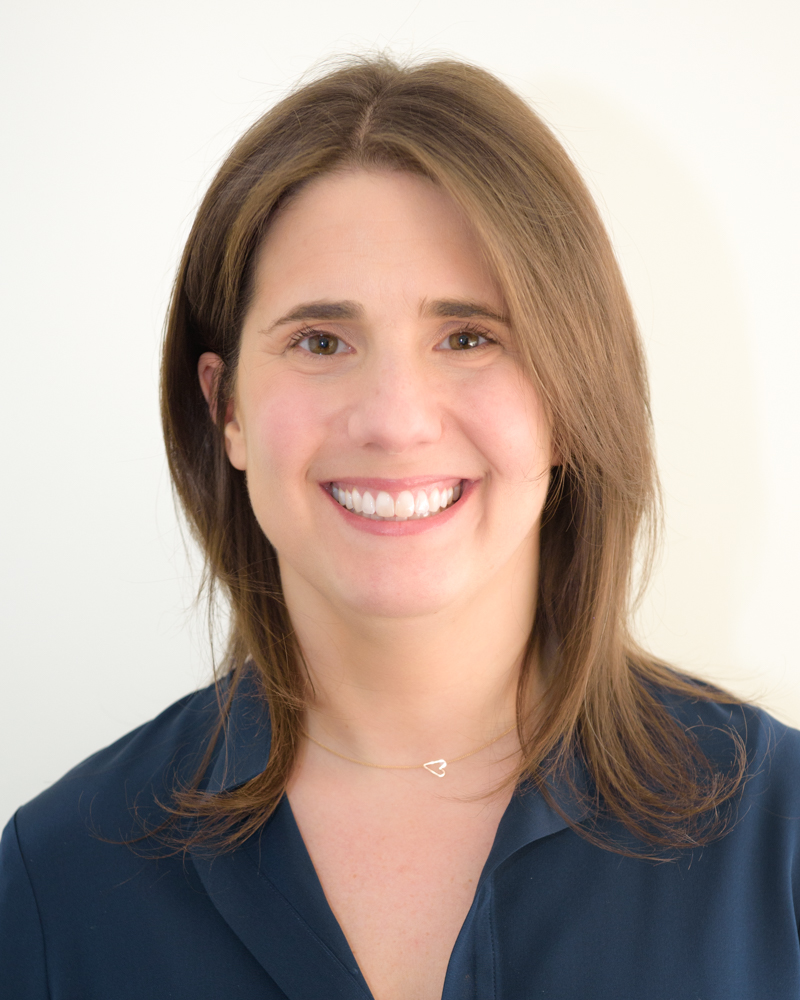 Headshot of Michelle Pullaro smiling directly at the camera.