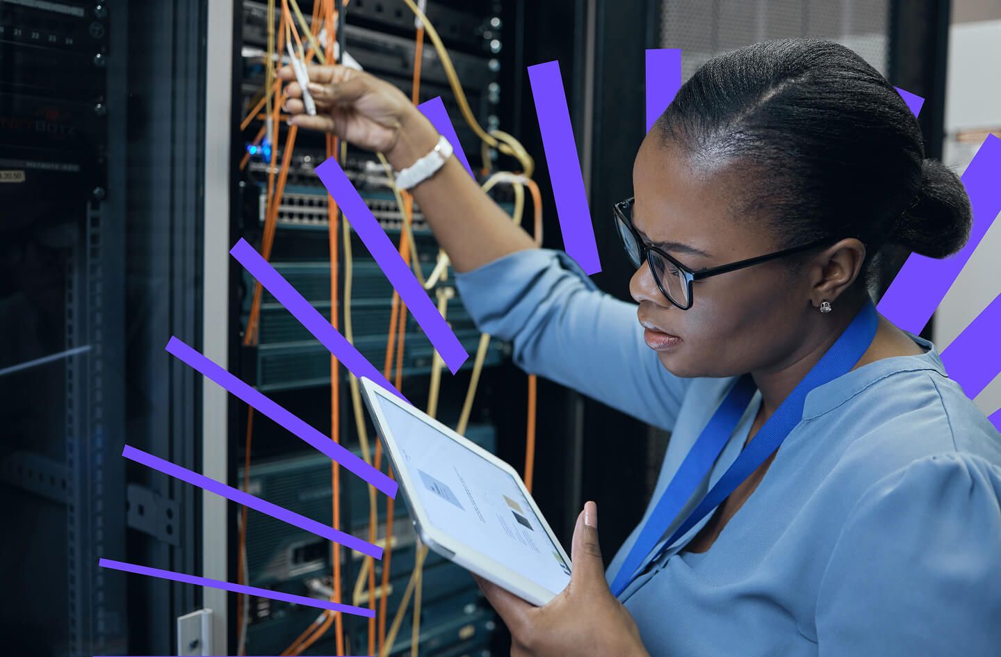IT technician in glasses inspects server cables while holding a tablet; purple rays highlight the data center’s technology and focus.