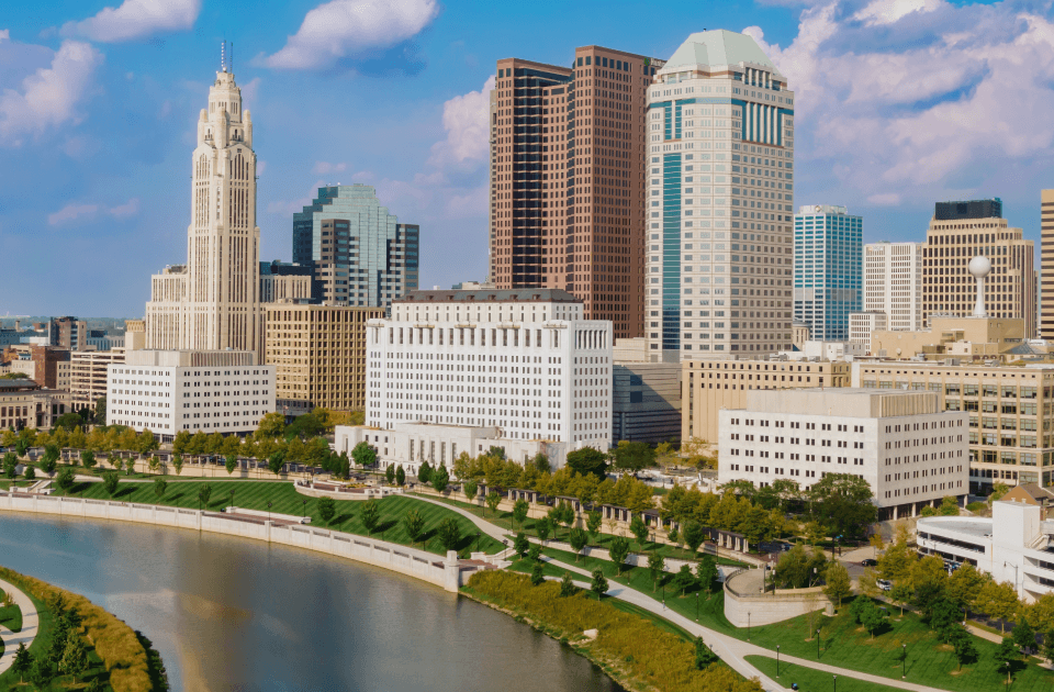 Downtown Indianapolis skyline overlooking the river and waterfront.